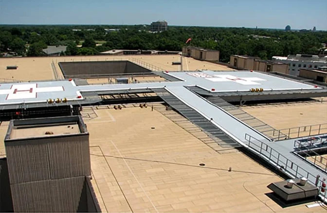 CFE Inc – Working around preinstalled steel beams with 44 recessed roof areas at various elevations were just part of the challenge.